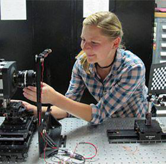 A woman configures the stereo camera calibration