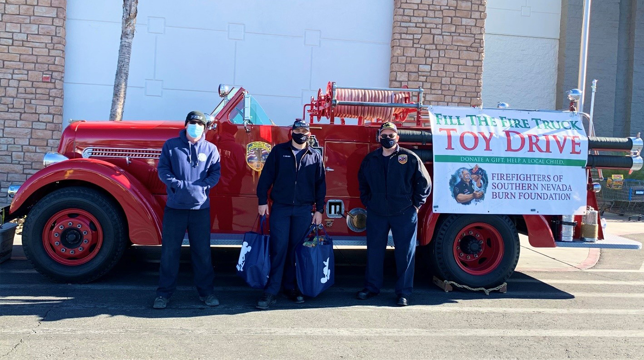 NNSS Fire & Rescue fills the Seagrave fire engine with toys that will be distributed to more than 28,000 local children.