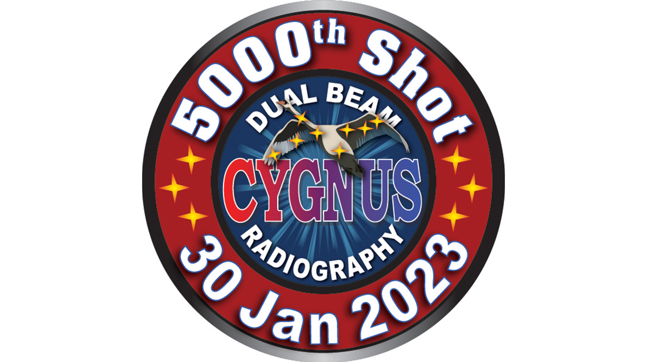 circular logo with red ring and yellow stars for 5000th Cygnus shot and 30 Jan 2023 date