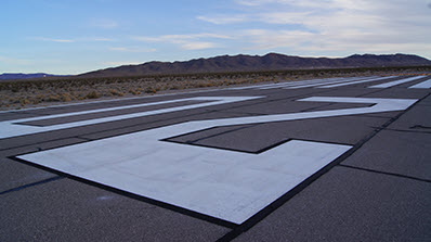 new white numbers on airport runway