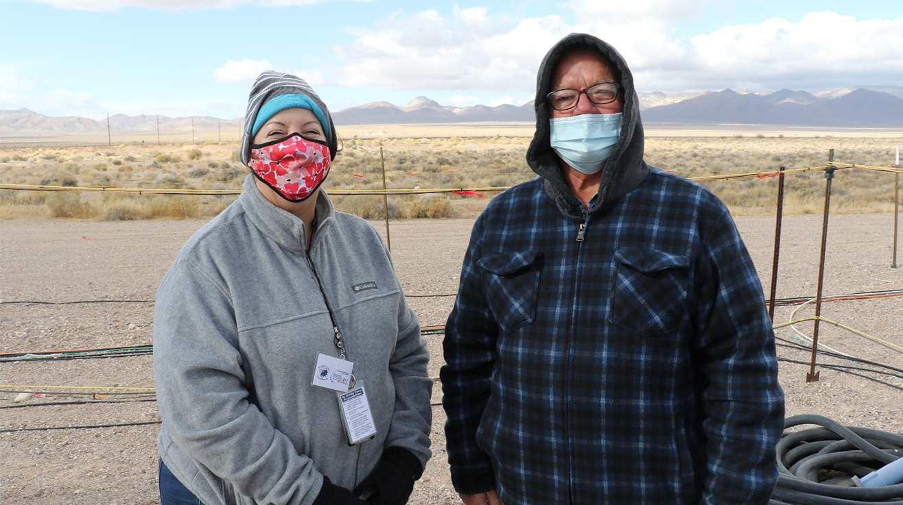 Senior Principal Engineer Lisa Garner and Physical Scientist Peter Munding prepare for the MDE at BEEF’s base camp.