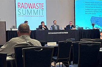 panel of speakers at table during RadWaste Summit