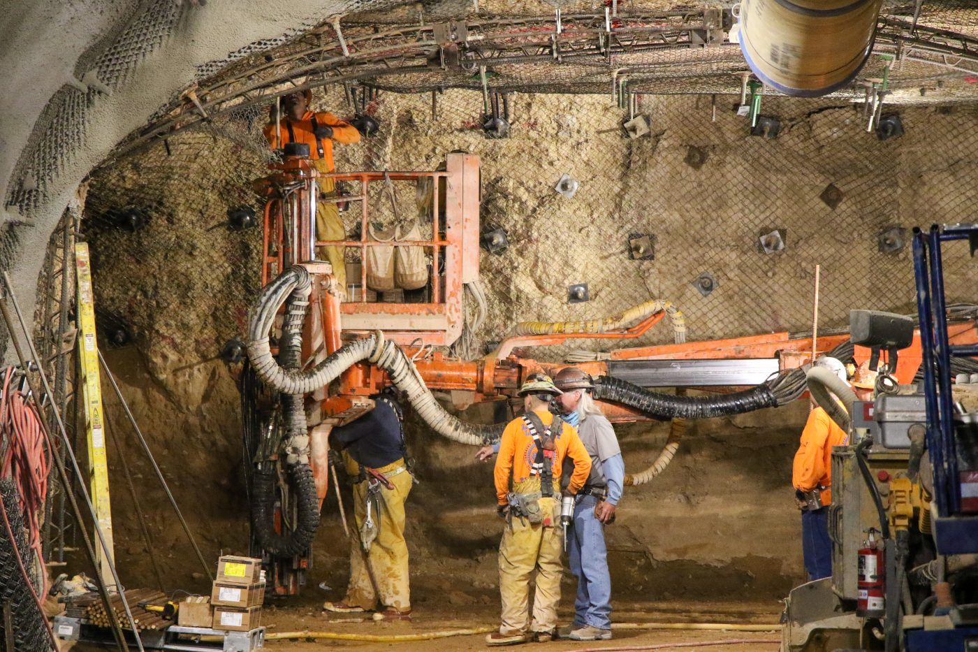five miners working in a tunnel at the U1a complex