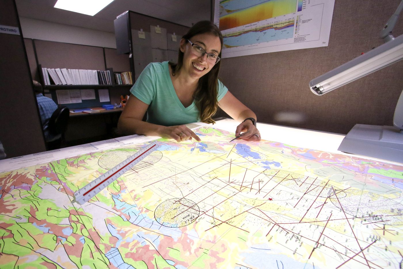 female employee with a map