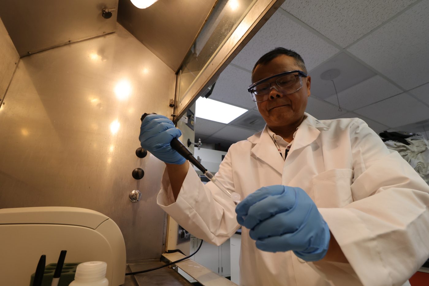 NNSS employee working in the environmental and ecological lab