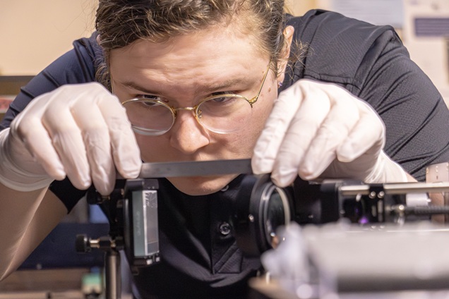 NNSS scientist Cody Kenstler inspects diagnostic equipment.