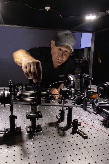 NNSS scientist Jeff Fornes manually tunes a laser.