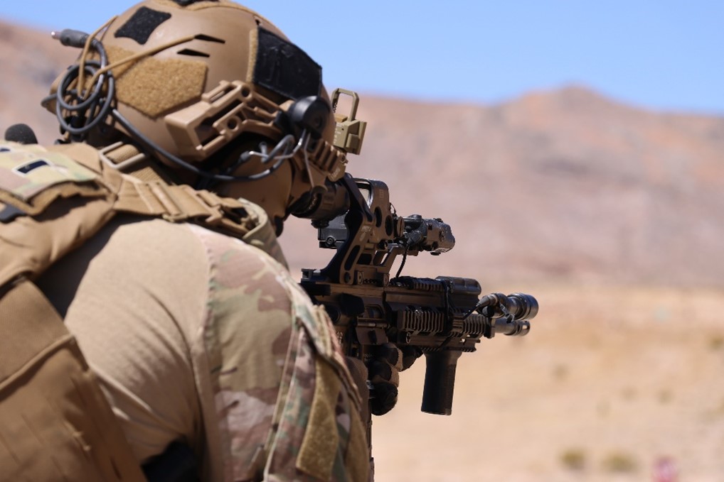 A member of the NNSS Protective Force prepares to fire at a target on a training range. 