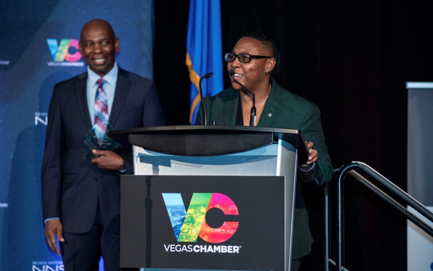 woman speaking at podium